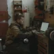 mechanic using laptop in garage 80x80