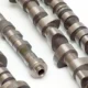 metal amshafts on a white surface 80x80